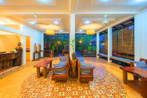 Posezení v ubytování Le Jardin d'Angkor Hotel & Resort