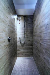 Kylpyhuone majoituspaikassa Villa Capodarco B&B