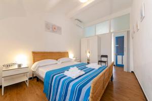 En eller flere senger på et rom på ALTIDO Flat for 4, close to 2 Beaches, Sestri Levante
