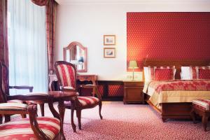 Postel nebo postele na pokoji v ubytování Arcadia Boutique Hotel