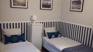Кровать или кровати в номере Apartamenty Premium 200m. do plaży