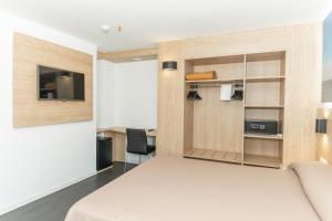 TV a/nebo společenská místnost v ubytování Hotel Prado II