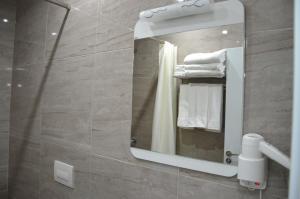 Koupelna v ubytování Hotel Beler + 37 fotografií