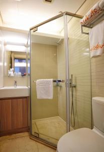 Koupelna v ubytování Mia Casa Hotel + 22 fotografií