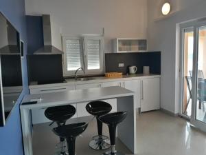 Кухня или мини-кухня в Apartmani Zoran
