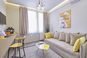 A seating area at Old Athens style 1bdr with Acropolis view rooftop!