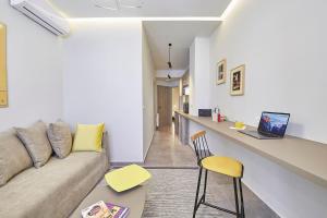 A television and/or entertainment centre at Old Athens style 1bdr with Acropolis view rooftop!