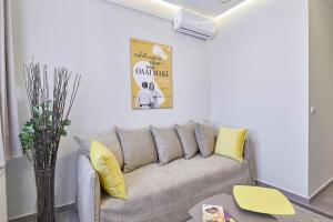 A seating area at Old Athens style 1bdr with Acropolis view rooftop!