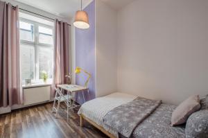Łóżko lub łóżka w pokoju w obiekcie OhMyHome - Kościuszki