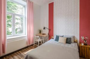 Łóżko lub łóżka w pokoju w obiekcie OhMyHome - Kościuszki