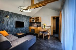 TV a/nebo společenská místnost v ubytování Holiday Village Tatralandia