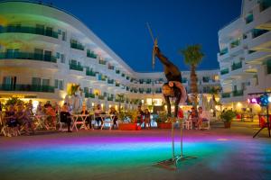 a person doing a trick in front of a building at Dragut Point South Hotel-All Inclusive in Turgutreis +120 photos