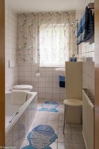 Ένα μπάνιο στο Ferienwohnung Seeberger