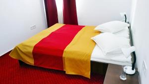 Postel nebo postele na pokoji v ubytování Hotel Teilor + 1 fotografie