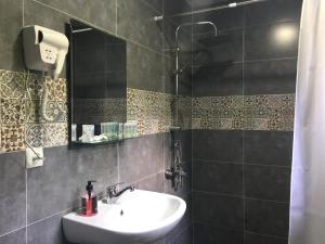 Ένα μπάνιο στο Guest House Maradona