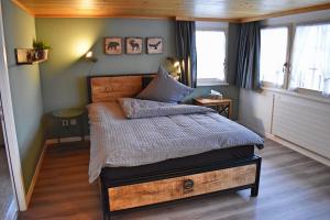 Ein Bett oder Betten in einem Zimmer der Unterkunft Gasthaus Sternen