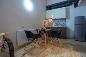 Kuhinja oz. manjša kuhinja v nastanitvi Wine Inn Borjomi Aparthotel
