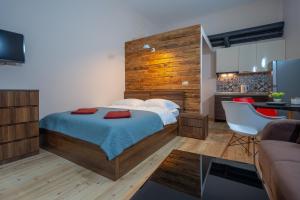 Postelja oz. postelje v sobi nastanitve Wine Inn Borjomi Aparthotel