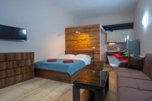 Postelja oz. postelje v sobi nastanitve Wine Inn Borjomi Aparthotel