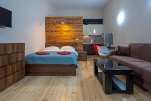 Postelja oz. postelje v sobi nastanitve Wine Inn Borjomi Aparthotel