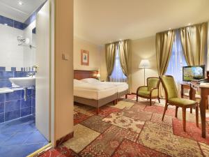 Posteľ alebo postele v izbe v ubytovaní EA Hotel Jeleni Dvur Prague Castle
