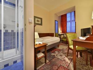 Posteľ alebo postele v izbe v ubytovaní EA Hotel Jeleni Dvur Prague Castle