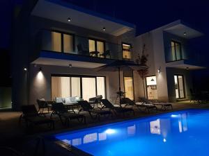 Bazén v ubytovaní Villa Olive Hill alebo v jeho blízkosti