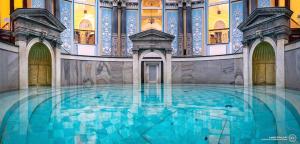 a large pool of water in a building at Zdrój Wojciech in Lądek-Zdrój