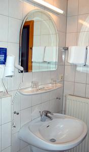 Koupelna v ubytování Hotel Gülser Weinstube