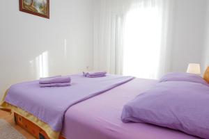 A bed or beds in a room at Villa Lavanda