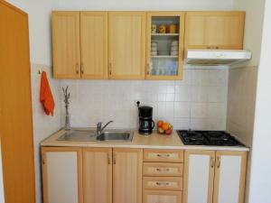 Kuchyňa alebo kuchynka v ubytovaní Apartments Jadranka Ivana Pula