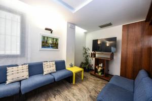 TV a/nebo společenská místnost v ubytování Hotel Caesar