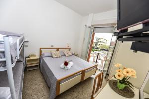 Postel nebo postele na pokoji v ubytování Hotel Caesar