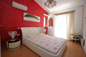 Łóżko lub łóżka w pokoju w obiekcie Villa Farran 1