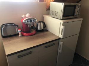Kuchyňa alebo kuchynka v ubytovaní Bier-Lak Apartman House 71