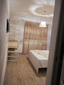 Postel nebo postele na pokoji v ubytování Domo Green House