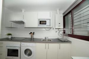 A kitchen or kitchenette at Casa Sabina 5