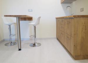 Kuchyňa alebo kuchynka v ubytovaní Hotel Boutique O Náutico Laxe