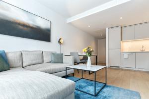 Postel nebo postele na pokoji v ubytování CitySuites Aparthotel + 37 fotografií