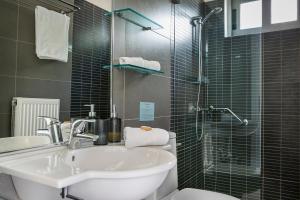 A bathroom at Aloni Villa - Contemporary Villa with Private Pool & Sea Views, Fiskardo