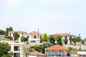a view of a village with houses at Yannis Apartments in Afitos