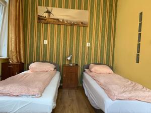 Llit o llits en una habitació de Hostel4u