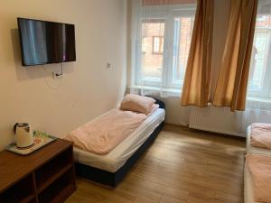 Llit o llits en una habitació de Hostel4u