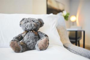 CitySuites Aparthotel客房内的一张或多张床位