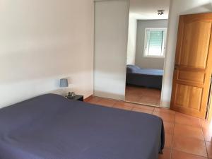 Postel nebo postele na pokoji v ubytování Appartement à la mer