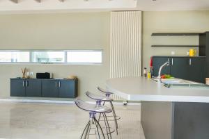 A kitchen or kitchenette at Aloni Villa - Contemporary Villa with Private Pool & Sea Views, Fiskardo