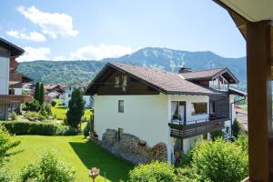 a house with a view of a yard at Rettenberger Murmele in Rettenberg