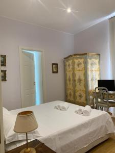 Postel nebo postele na pokoji v ubytování B&B Villa Etelka