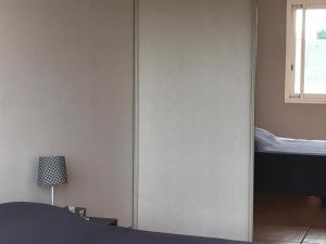 Postel nebo postele na pokoji v ubytování Appartement à la mer