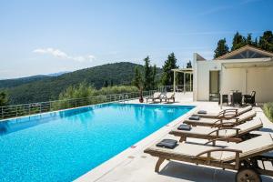 The swimming pool at or close to Aloni Villa - Contemporary Villa with Private Pool & Sea Views, Fiskardo